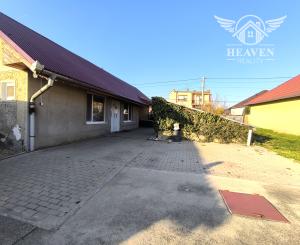 Ponúkame na predaj štýlový dom s veľkým pozemkom a garážou