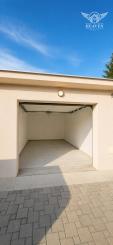 NA PREDAJ nová garáž v centre obce Bátorové Kosihy